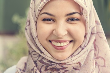 Close up face of Islamic woman smiling