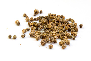beet seeds close-up on a white background.