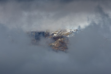 mountain between the cloud