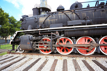 Fototapeta na wymiar Old out of date rust steam train locomotive