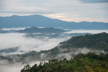 Mist over the mountain in the morning time