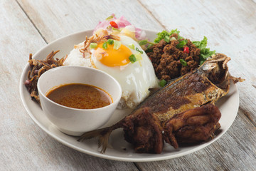 fried chicken and fried fish rice with curry