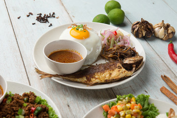 fried chicken and fried fish rice with curry