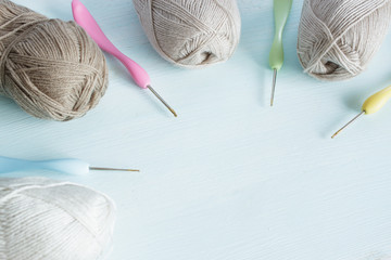 Threads and hooks for knitting. Scandi style. Copy space.