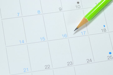 calendar with long holiday dates and pencil