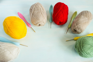 Colorful yarn and hooks for knitting. Copy space.