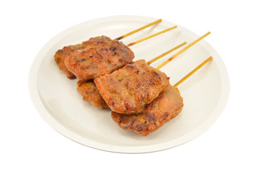 Grilled pork skewer in plate