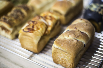 Fresh bread on table close-up. Fresh bread on the kitchen table The healthy eating and traditional bakery