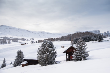 small house in winter at italy