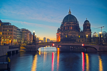 Naklejka na ściany i meble Berlin Cathedral on Spree river at night, Berlin, Germany