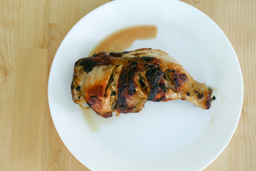 Grilled chicken burns on dish.