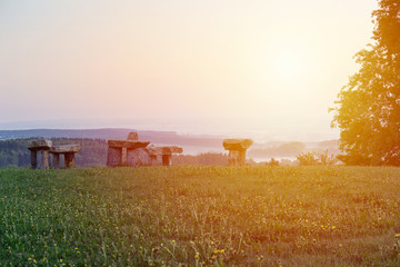 Stonehenge in village Krasejovka at sunrise, Czech landscape