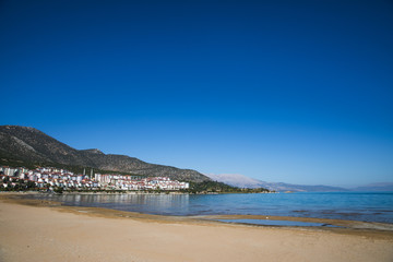 tranquil landscape with buildings on coast, salda golu, turkey