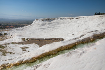 spectacular view of famous white geological formations in pamukkale, turkey