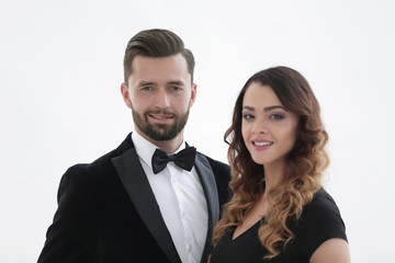 Portrait of a handsome man looking at the camera with a woman