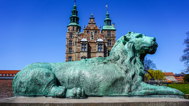 Lion statue in front of Rosenborg Castle, Copenhagen, Denmark