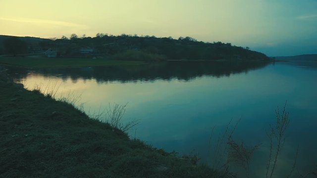 Landscape of beautiful after sunset sky over river