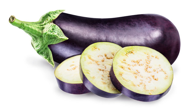 Aubergine or eggplant with aubergine slices on white background.