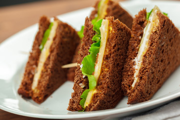 sandwich on a wooden table