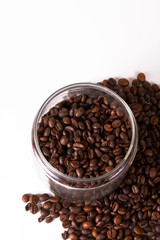Coffee cup and beans on old kitchen table. Top view with copyspa