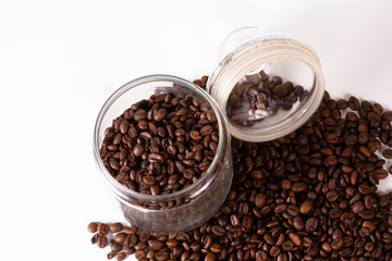 Coffee cup and beans on old kitchen table. Top view with copyspa