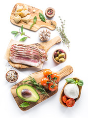 Variety of popular Italian food on white background. Top view.