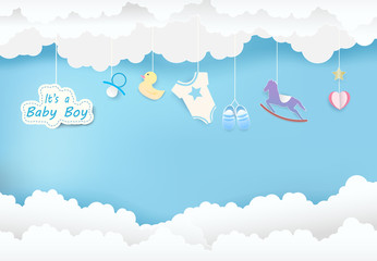 Paper art of cloud with toy shower on blue sky paper cut style, baby boy card illustration - obrazy, fototapety, plakaty