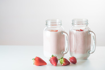 Strawberry milkshake in the glass jar