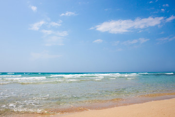 Fototapeta na wymiar Sand sea beach on sunny day