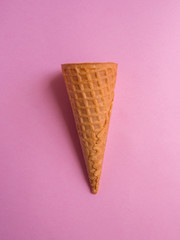 Ice cream cone on pink background