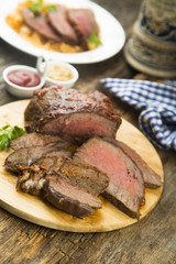 Homemade roastbeef on wooden board