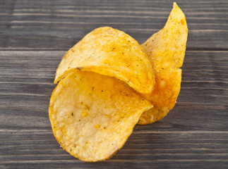 potato chips on a wooden background