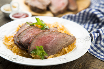 Beef fillet serves with sauerkraut