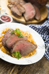 Beef fillet serves with sauerkraut