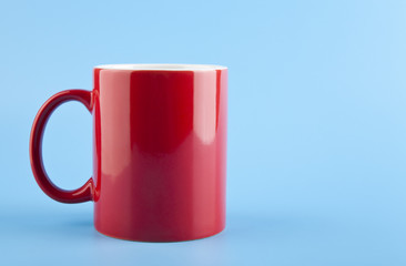 red cup on a blue background
