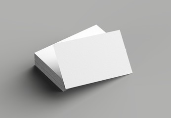 Business card mock up isolated on gray background. Horizontal. 3D illustrating.