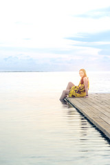 Beautiful girl on holiday in Maldives	