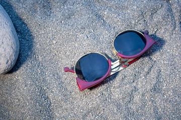 Sunglasses on the sand
