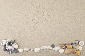 Seashells and stones with a pattern of sand for relaxation as a background