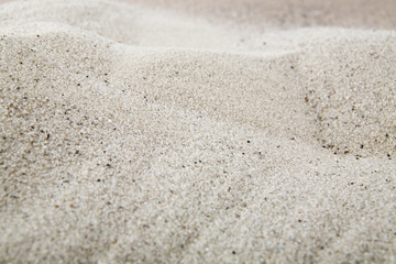Fototapeta na wymiar placer of sand as a background