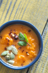 Bowl of pumpkin cream soup