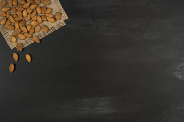 Almonds  in a black chalkboard.