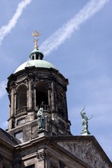 bell Tower With Statues under a blue sky