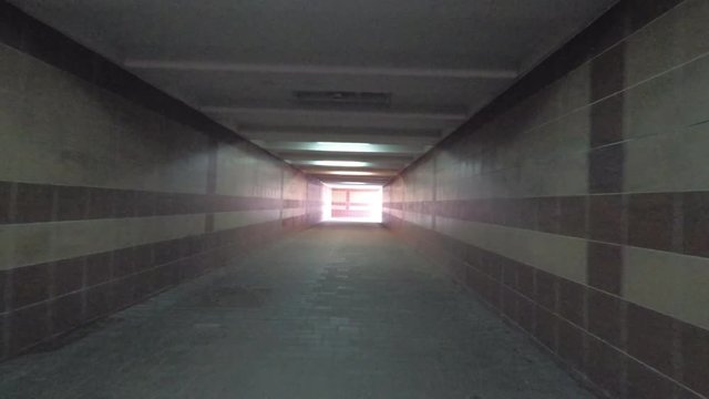 underground pedestrian crossing. barrier-free environment. metal railing.