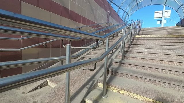 underground pedestrian crossing. barrier-free environment. metal railing.