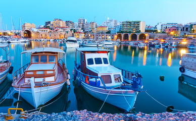 Old fishing boats in port of Heraklion - obrazy, fototapety, plakaty