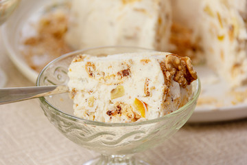 Curd cake sprinkled with walnuts