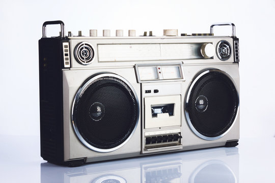 Stylish retro boombox on white