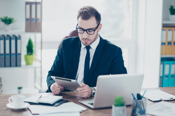 Leadership people person executive employer employee concept. Serious focused concentrated busy smart handsome thoughtful minded pensive entrepreneur using digital device for chatting with colleagues