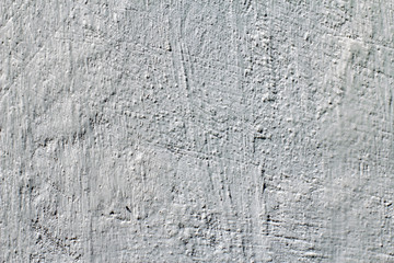 Obraz premium Grungy white concrete wall background. Wall with painted stucco